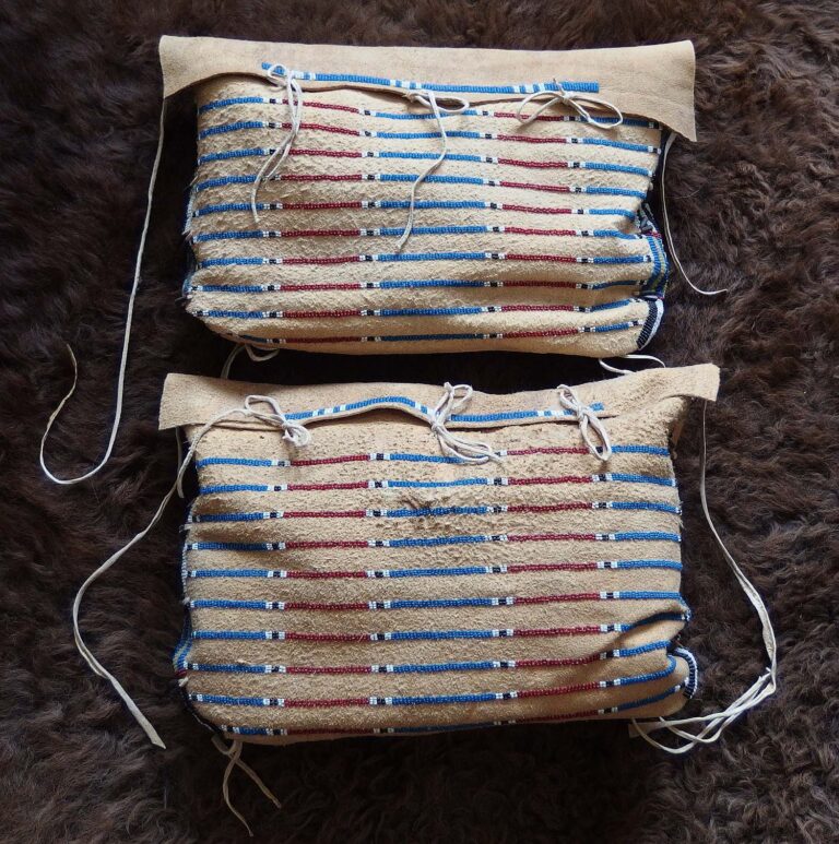Tipi bag reproductions made by the author of this article. The material used is dry-scraped and brain-tanned buffalo hide, as seen in historical originals. It is not enough to use only brain-tanned hides; they also should be processed using the same methods that were used by Indians on the Great Plains before 1880.